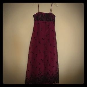 Long, floor length burgundy gown